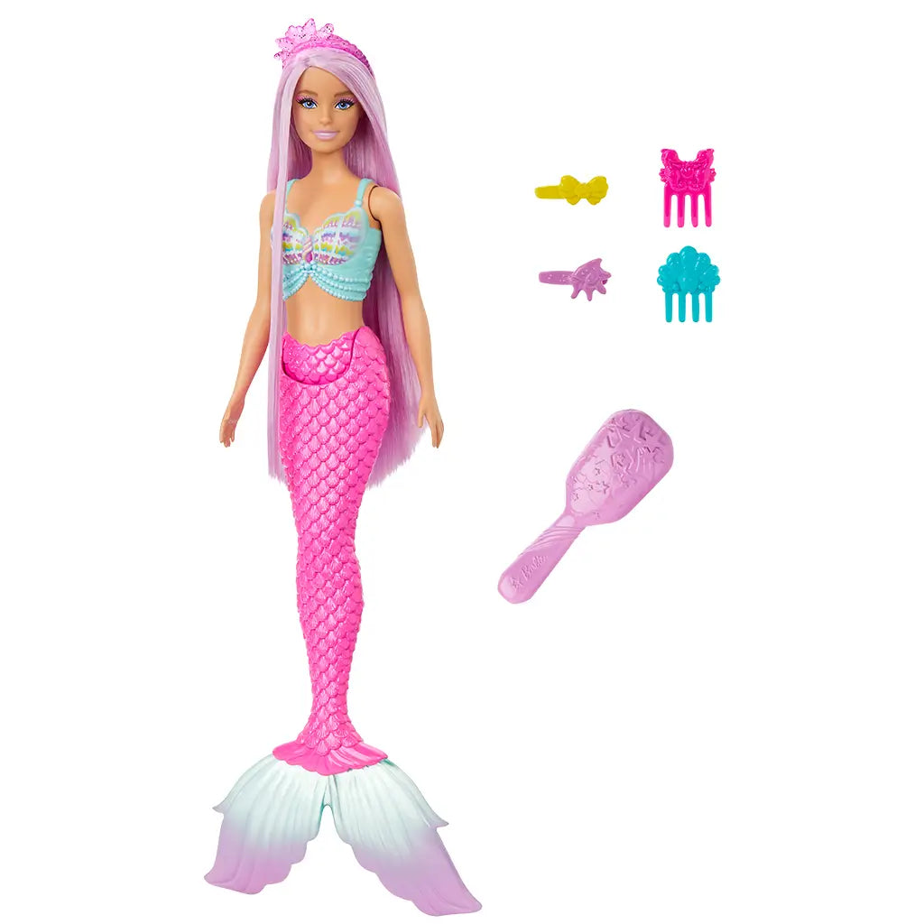 Barbie mermaid doll wearing a pink tail and pastel shell top, includes pink comb and colorful barrettes shaped like bows, animals, and sea icons.