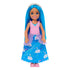 Barbie Chelsea doll front view showing blue hair, silver headband, pink top with textured details, and full-length swan-patterned skirt with purple glitter accents.
