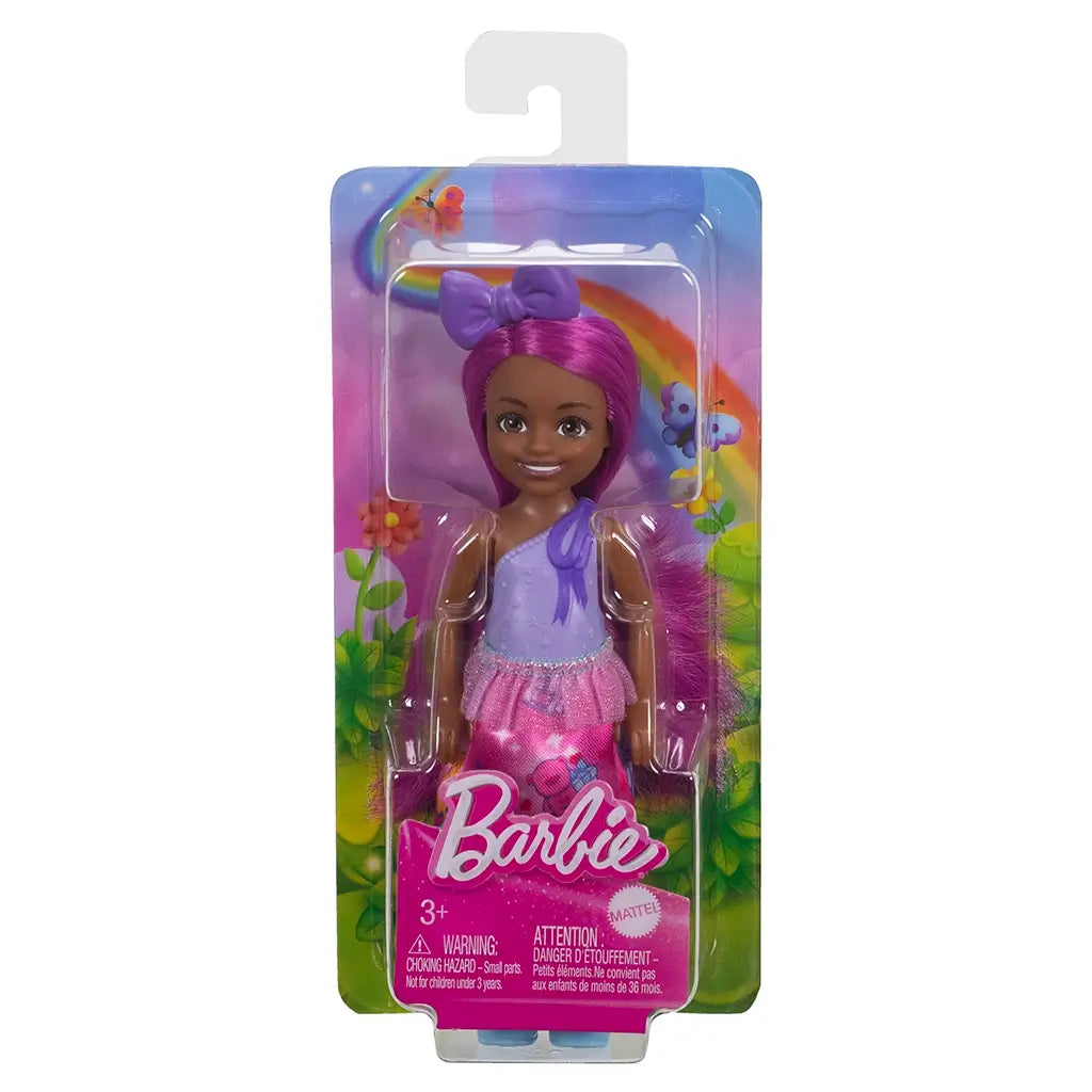 Front of Barbie Chelsea doll package with doll in clear plastic, rainbow background, floral details, and Barbie logo in pink over sparkly backdrop.