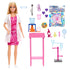 Barbie Scientist Doll and accessories set displayed outside the box, including pink lab table, toy beakers, microscope, petri dish, and colorful experiment pieces for STEM-inspired play.