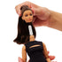 Close-up of Barbie Signature Basics Model 05 doll showing detachable head and neck connector, designed for easy customization and poseability.