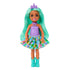 Barbie Chelsea doll with long mint green hair wears a lavender textured top, multicolor printed skirt, turquoise boots, and a unicorn horn headband, posed on white background.