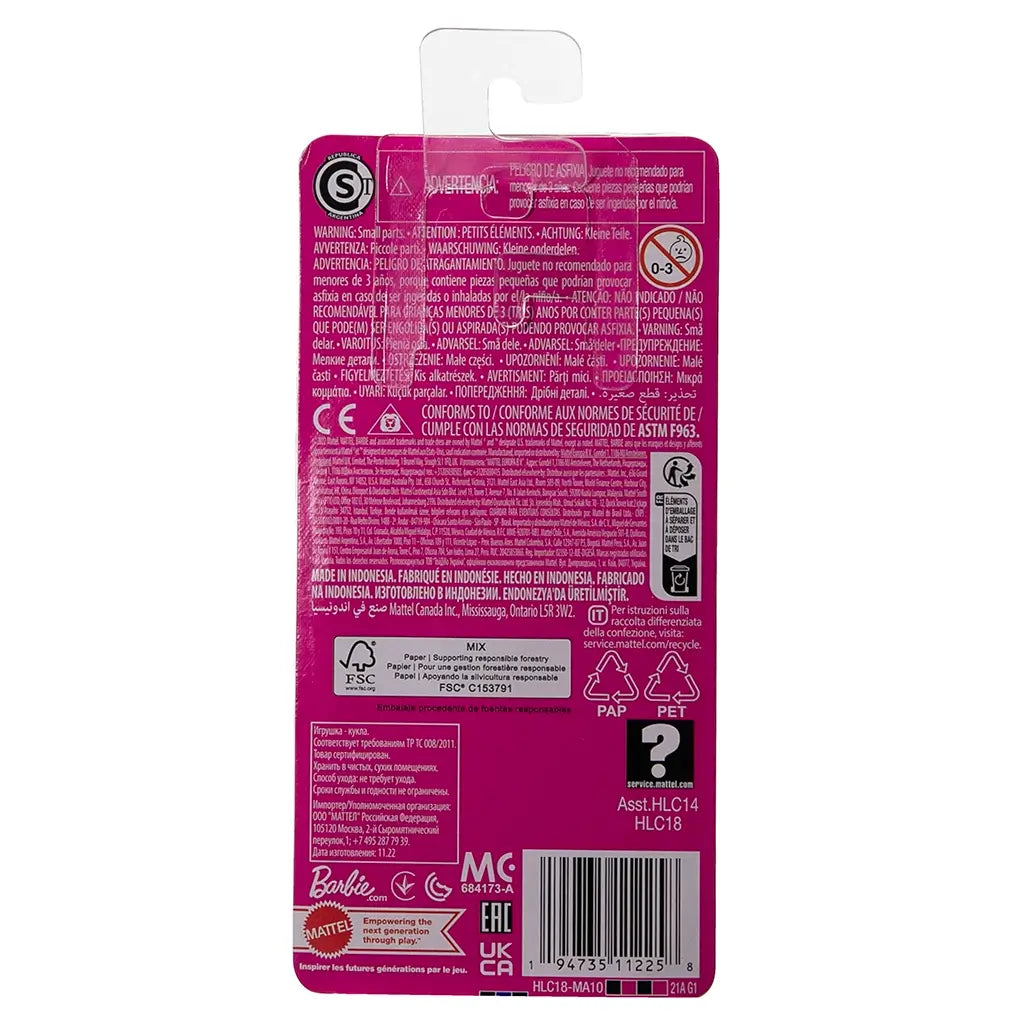 Back of Barbie Chelsea doll’s retail packaging with pink background, product safety warnings, recycling symbols, and manufacturer details.