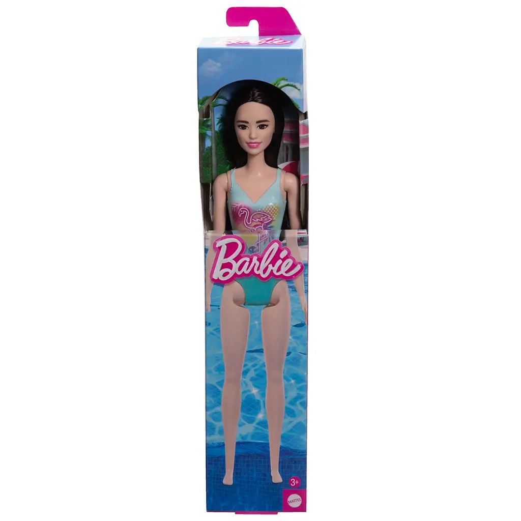 Barbie doll packaging with a pool and palm tree design on a white background