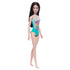 Barbie doll with dark brown hair in a colorful teal swimsuit with a flamingo on a white background