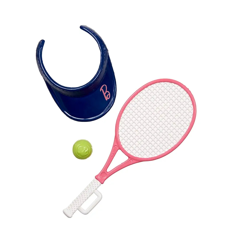 Barbie doll accessories include a shiny blue visor, pink and white tennis racket, and a bright green tennis ball, designed to complement the sports-themed doll.