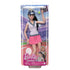 Barbie tennis player doll in retail packaging, wearing a white textured sleeveless top, pink skirt, blue visor, and holding a pink racket with tennis court backdrop.