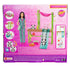Back of Barbie panda care playset package with illustrated instructions, showing doll in scrubs, slide, hammock, panda figures, and more than 20 included accessories.