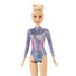Close-up of Barbie rhythmic gymnast doll with blonde hair in a high bun, wearing a long-sleeved, shimmering purple and blue leotard with geometric details.