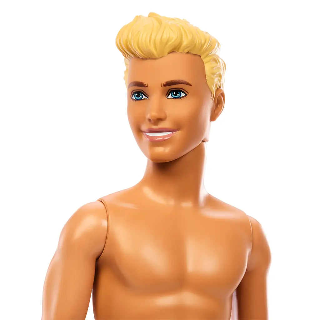 Close-up of Beach Ken doll with blond hair, blue eyes, tan skin, and a friendly smile.