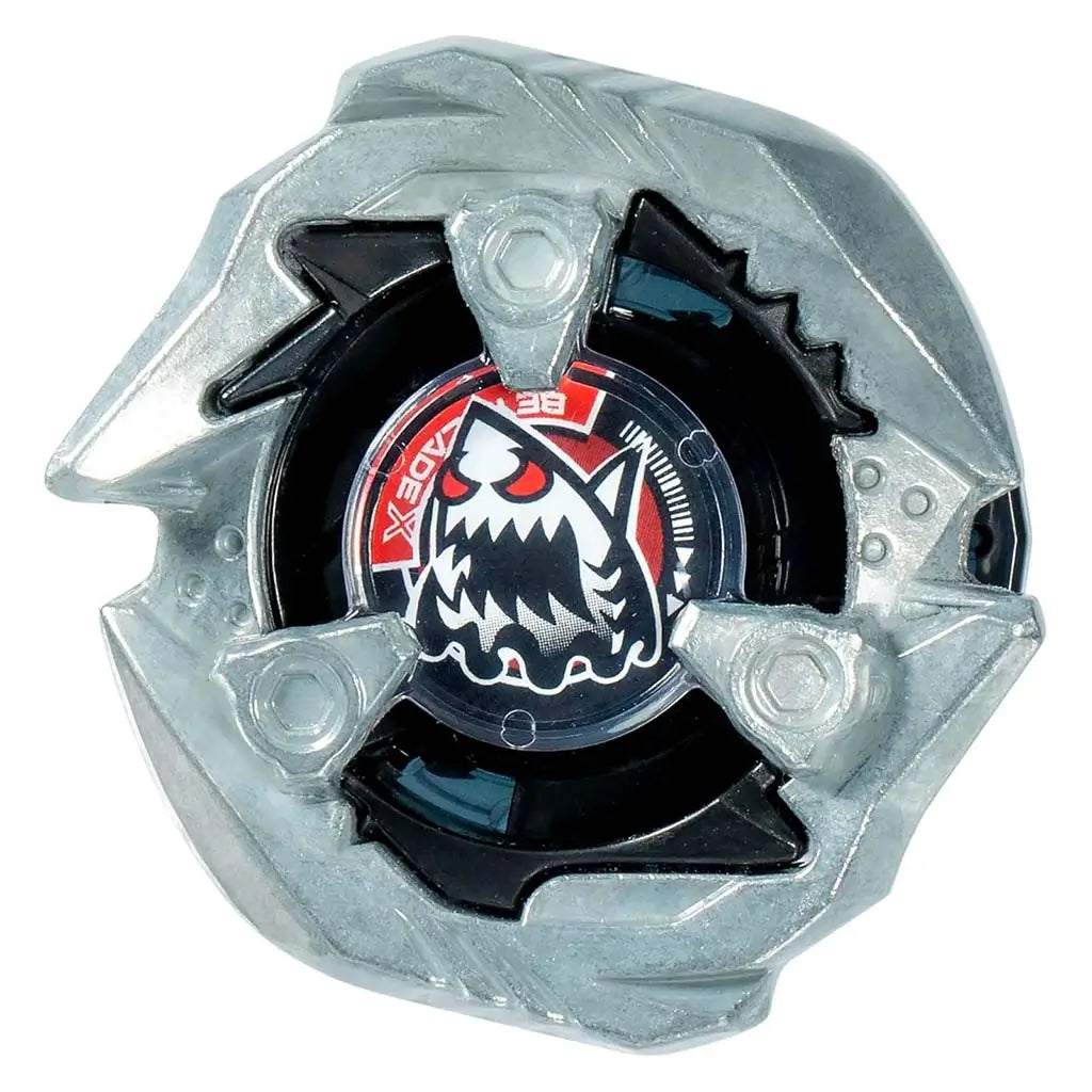 Design close-up of the Keel Shark top shows silver carved edges and black plastic layers around a red shark-themed core, emphasizing pointed contours and attack-focused form on white background.