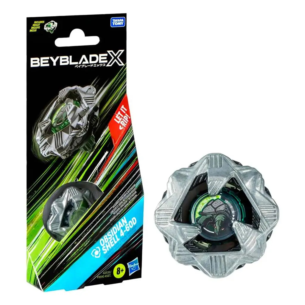 Obsidian Shell Beyblade X packaging features silver and black plastic top with angular shell-like armor around a green core on a black card background marked by neon streaks emphasizing defense play.