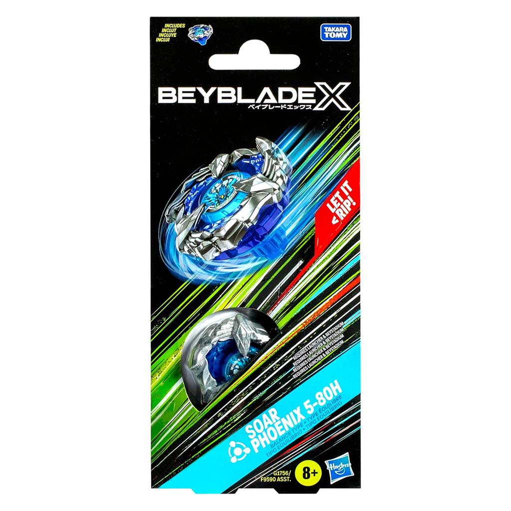 Beyblade X Soar Phoenix booster front shows the silver and blue top spinning across a black background with green and red streaks, highlighting the wing-shaped design and clearly marking included components.