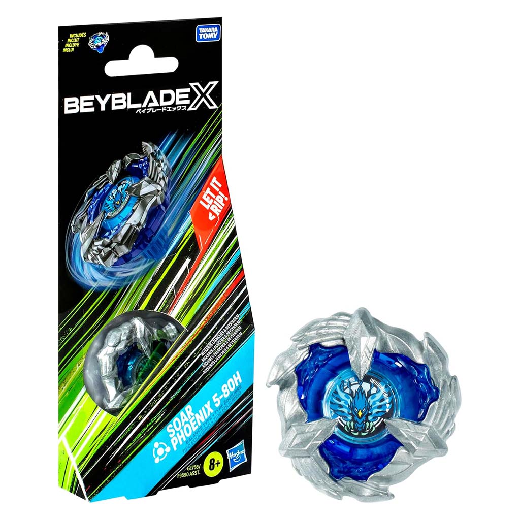 Beyblade X Soar Phoenix packaging shows silver and blue plastic top with carved wing-like shapes forming a circular battle form on a black card background with neon streaks promoting the booster set.