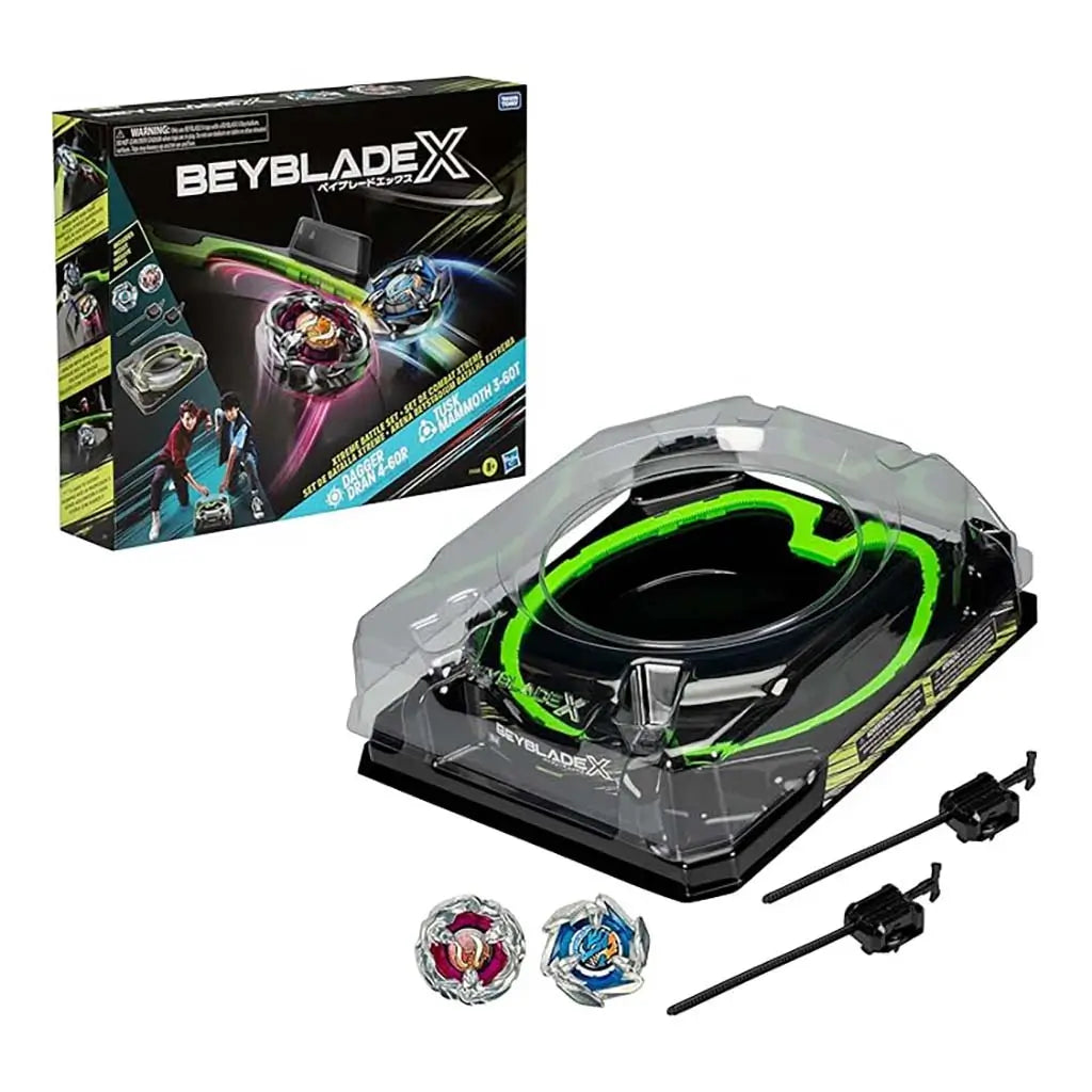 Takara Tomy Beyblade X Xtreme Battle Set showing Beystadium with green Xcelerator rail, two tops, two launchers, and packaging featuring Dagger Dran 4-60R and Tusk Mammoth 3-60T designs.