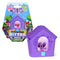 Bitzee interactive digital pet doghouse toy featuring a purple plastic house with pixel-textured details, arched window screen, and animated digital dog character displayed inside, photographed on a white background.