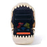 Jurassic World Bitzee digital pet toy showing a beige speckled plastic dinosaur mouth with textured teeth and a black interior, displaying colorful pixel dinosaur animations on an LED screen against a white background.