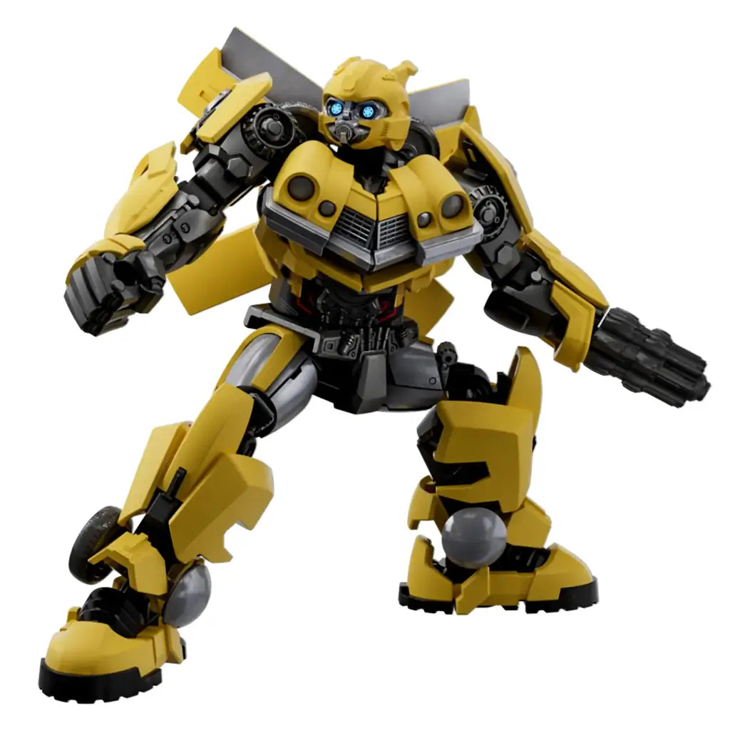Transformers Bumblebee figure by Blokees features yellow and black molded armor, bright blue eyes, car-panel details, and an articulated robot pose with arm cannon.