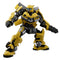 Transformers Bumblebee figure by Blokees features yellow and black molded armor, bright blue eyes, car-panel details, and an articulated robot pose with arm cannon.