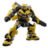 Transformers Bumblebee figure by Blokees features yellow and black molded armor, bright blue eyes, car-panel details, and an articulated robot pose with arm cannon.