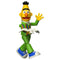 Blokees Sesame Street Bert toy figure in green outfit with colorful striped shirt, holding a white pigeon and waving with articulated joints.