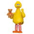 Blokees Sesame Street Big Bird collectible figure made of bright yellow plastic with detailed feathers, holding a teddy bear, and standing upright with orange feet and cheerful expression.