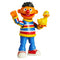 Blokees Sesame Street Ernie toy figure posed with raised arm and cheerful expression, holding his yellow rubber duckie companion.