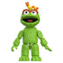 Green Blokees Oscar the Grouch toy figure with wide smile, brown eyebrows, and articulated limbs, featuring Slimy the worm on his head.