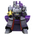 Blokees Transformers G1 Megatron action figure seated on a purple throne, holding a glowing yellow creature in one hand, showcasing metallic gray armor and detailed Decepticon insignia.