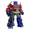 Red, blue, and gray plastic Transformer robot toy with metallic detailing and large black blaster, posed standing upright on a white background, showcasing articulated limbs and mechanical features.