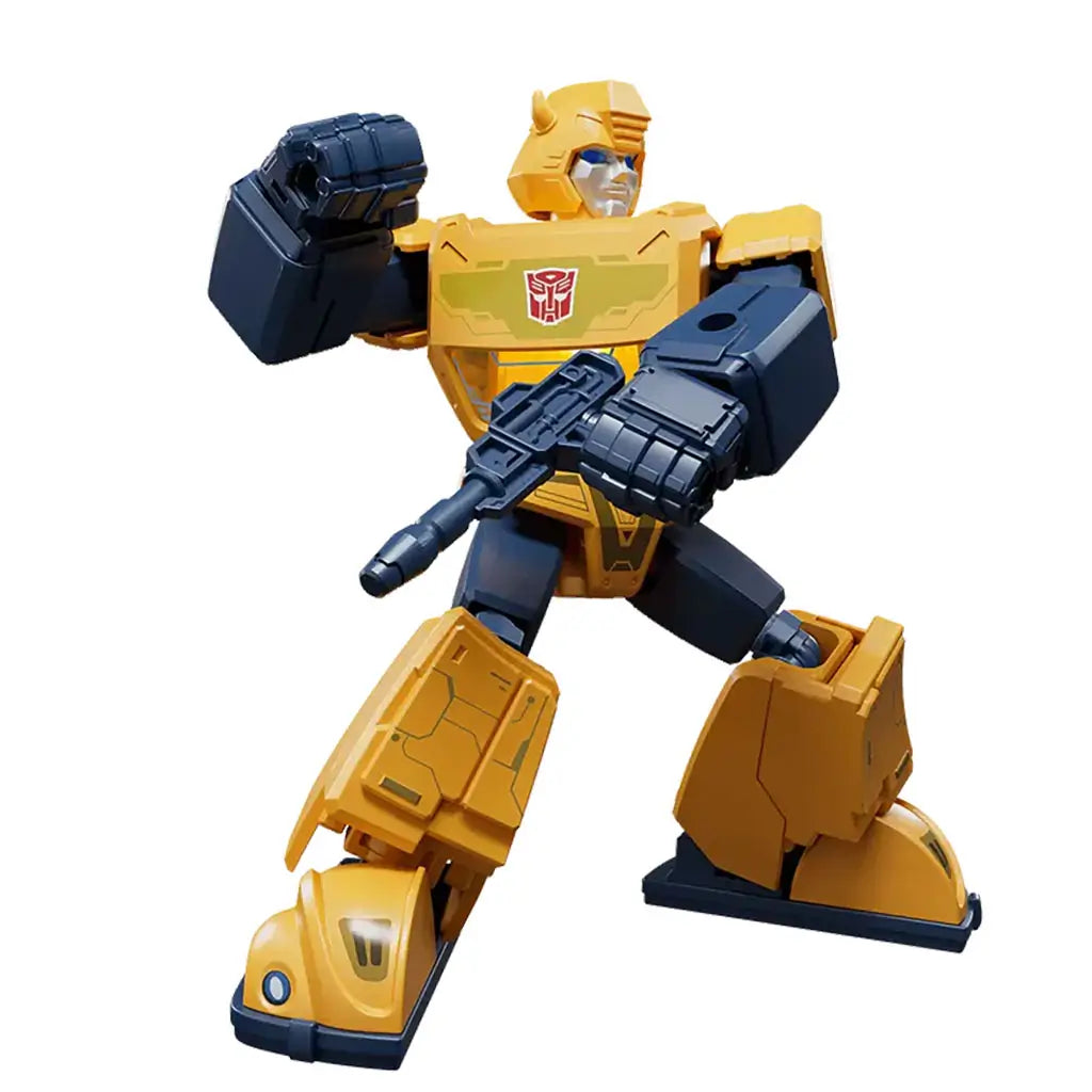 Yellow and black Transformers Blokees figure resembling Bumblebee, posed in a combat-ready position holding a blaster with detailed armor plating and Autobot emblem.