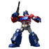 Red and blue Optimus Prime-style Blokees figure with silver faceplate and raised weapon, showing heroic stance and sharp-edged mechanical design.