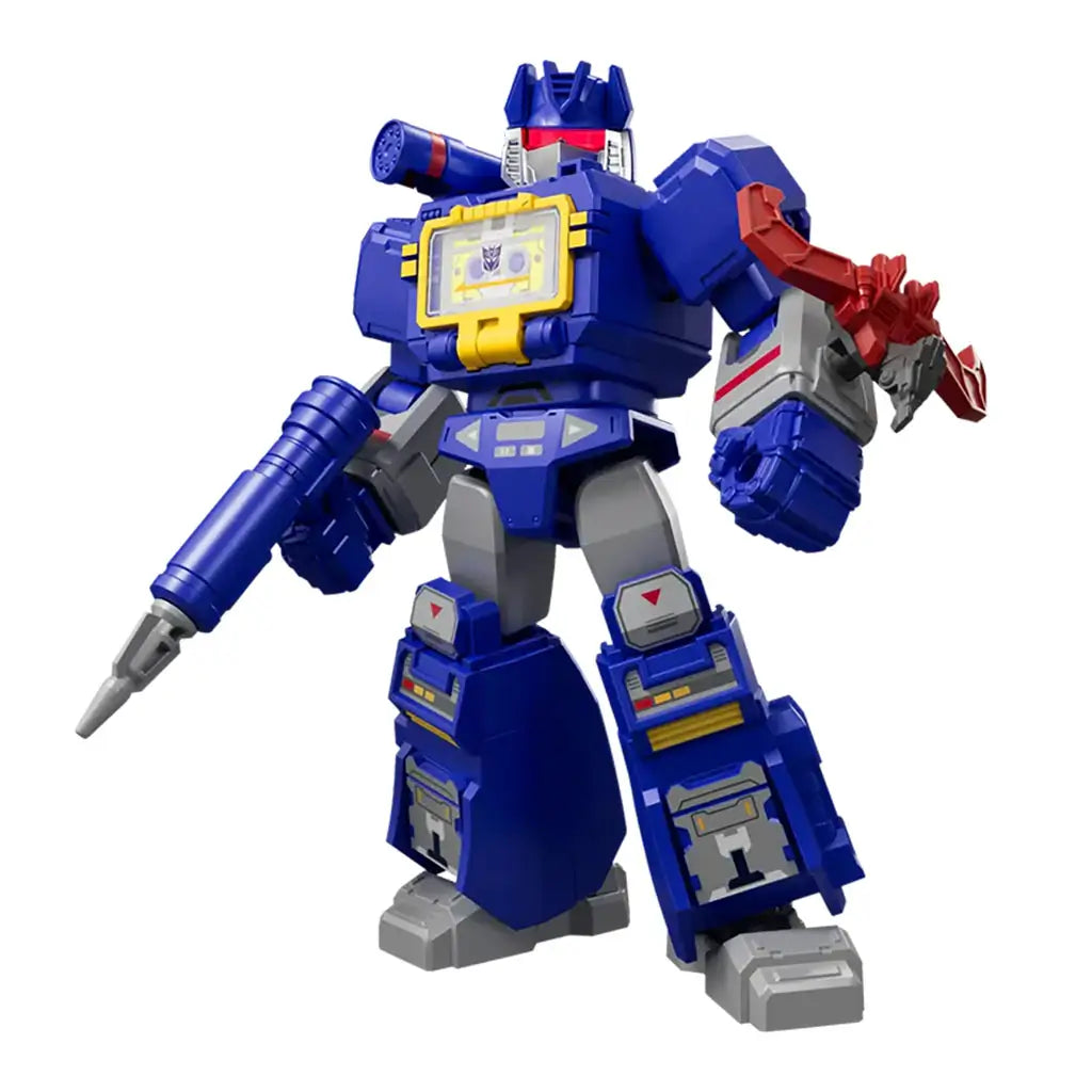 Blokees Transformers Shining 1985 blue and gray Decepticon robot toy figure with yellow chestplate and large blaster weapon.