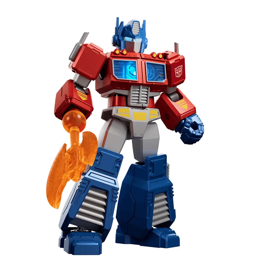 Transformers Blokees Shining Version Optimus Prime figure with red, blue, and silver body holding a translucent orange axe, displayed in bright lighting with detailed sculpted features.