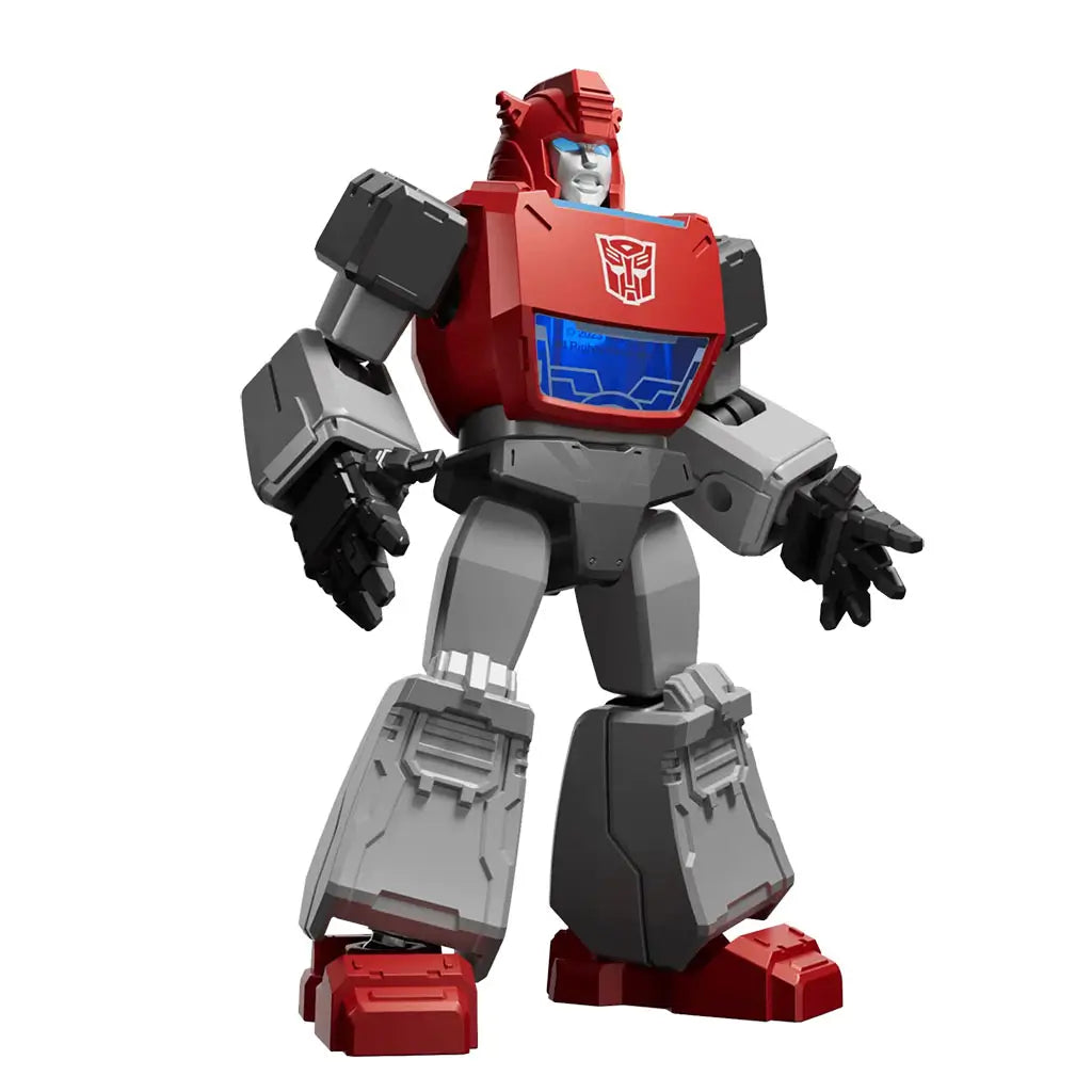 Transformers toy figure of Ironhide showing red and gray metallic armor, blue chest window with Autobot insignia, and a sturdy pose emphasizing its strong, protective design.
