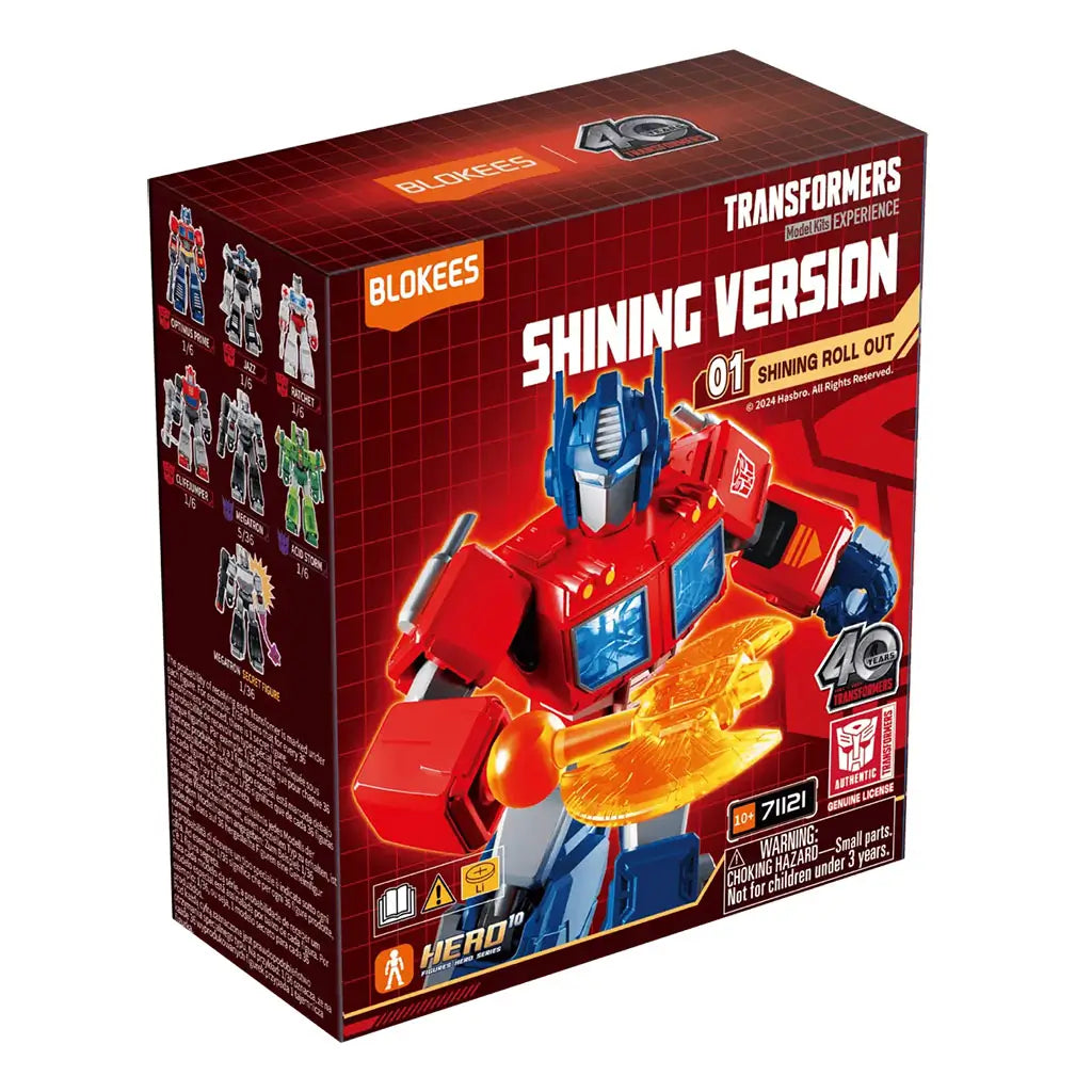 Transformers Blokees Shining Version “Shining Roll Out” box showing Optimus Prime with a glowing orange axe on bright red packaging, featuring Hasbro 40th anniversary branding and collectible lineup preview.