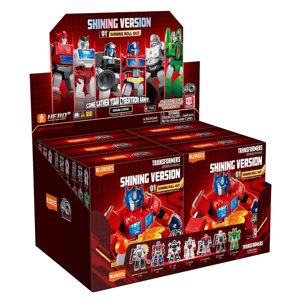 Display box of Transformers Blokees Shining Version collectible toys featuring Optimus Prime on red packaging, showcasing full character lineup and Hasbro’s 40th-anniversary branding.