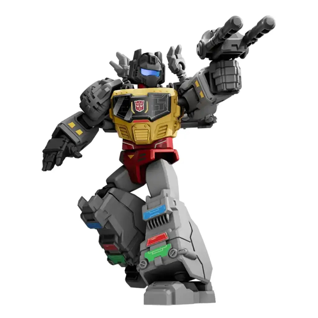 Gray and gold Blokees Transformers action figure styled as a robotic dinosaur warrior, shown in a battle stance with articulated limbs and mechanical detailing on arms and legs.