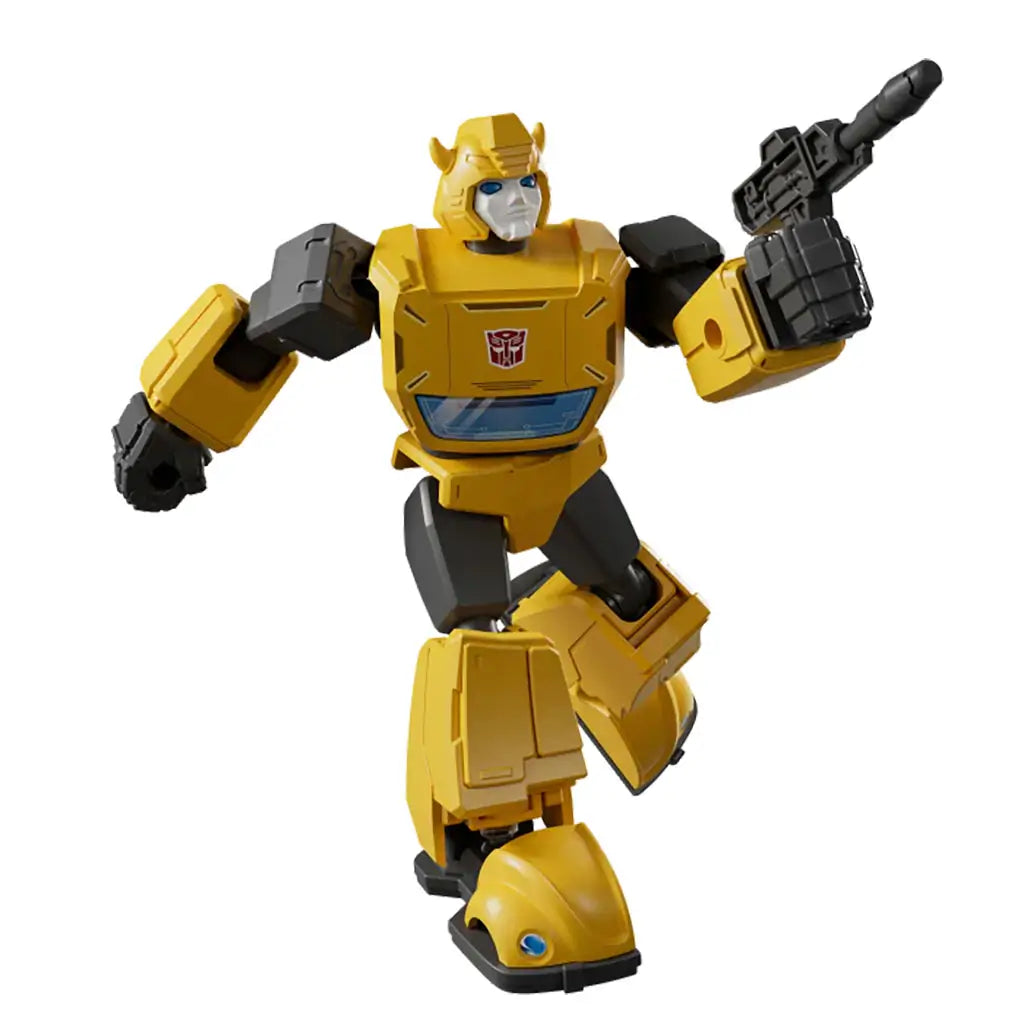 Yellow and black Blokees Transformers robot toy figure holding a blaster, shown in an action stance with visible Autobot insignia on chest and articulated mechanical joints.