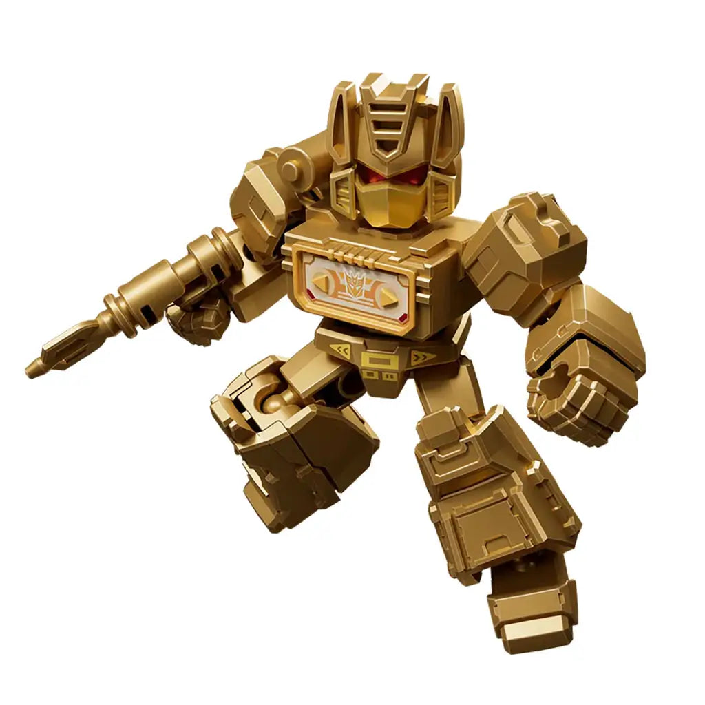 Golden Transformers action figure with metallic finish and red eyes, holding a futuristic weapon in battle stance, emphasizing intricate mechanical sculpt and armor detailing.