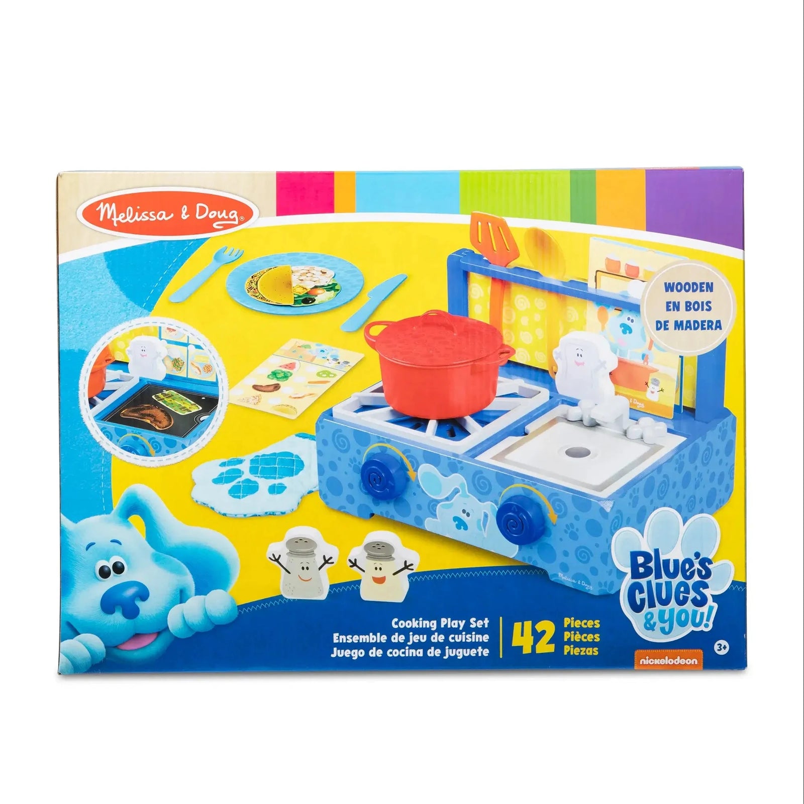 Packaging of Melissa & Doug Blue’s Clues wooden cooking play set showing stove, sink, red pot, utensils, pretend food, and 42-piece count for kids ages 3+.