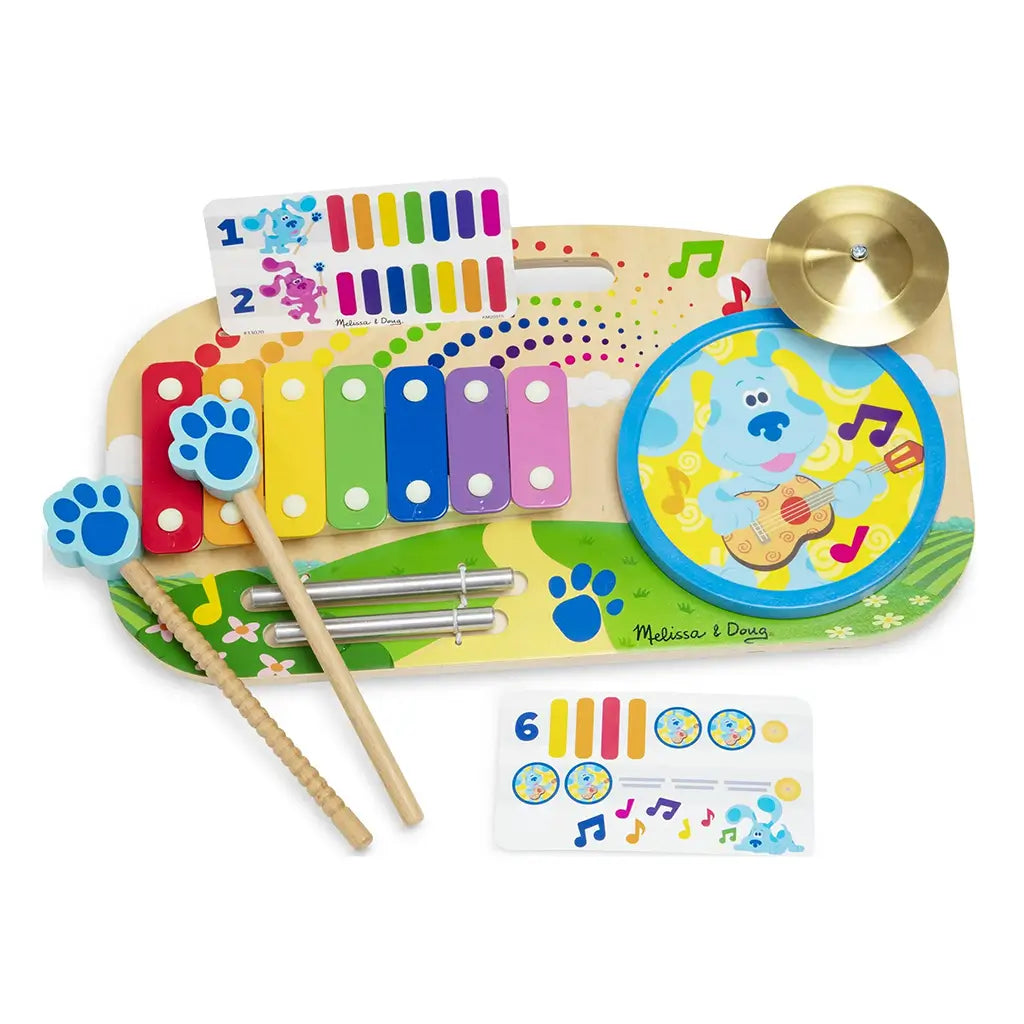 Full Melissa & Doug Blue’s Clues & You! wooden music maker board set including rainbow xylophone, drum, cymbal, music cards, and paw-print drumsticks, designed for imaginative musical playtime.