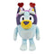 Smoochy Kiss Bluey plush toy in soft light-blue and navy fabric features a rounded dog shape with a yellow muzzle, embroidered eyes, and a pink headband topped with glittery red heart antennae against a white background.