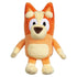 Bingo plush toy in warm orange and cream fabric shows a soft rounded dog shape with large embroidered eyes, smooth velvety texture, and outstretched limbs posed clearly on a plain white background.