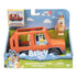 Bluey Heeler Family Road Trip 4WD Vehicle appears in open-front retail packaging, displaying the orange car and included Chilli figure against colorful Bluey artwork with clouds and grassy hills.