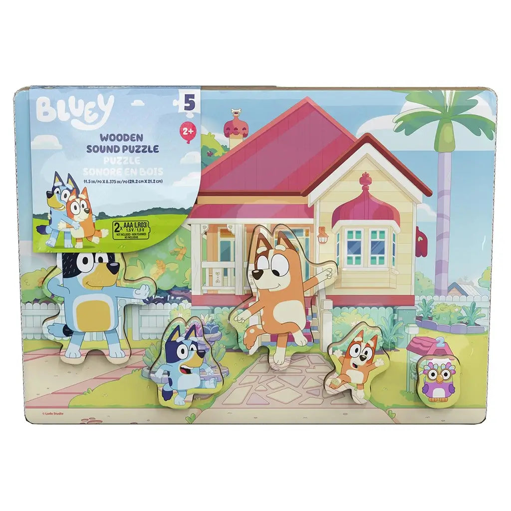 Bluey wooden sound puzzle board in bright multicolor painted wood with character shapes, showing Bluey family figures in a home garden scene, designed as a children’s interactive learning toy on a white background.
