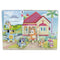 Bluey wooden sound puzzle board in bright multicolor painted wood with character shapes, showing Bluey family figures in a home garden scene, designed as a children’s interactive learning toy on a white background.