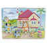 Bluey wooden sound puzzle board in bright multicolor painted wood with character shapes, showing Bluey family figures in a home garden scene, designed as a children’s interactive learning toy on a white background.