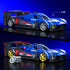 Blue Cadillac Project GTP hypercar brick model with plastic racing body, white accents and rear wing, shown at 1:32 scale with silver and gold wheel options.