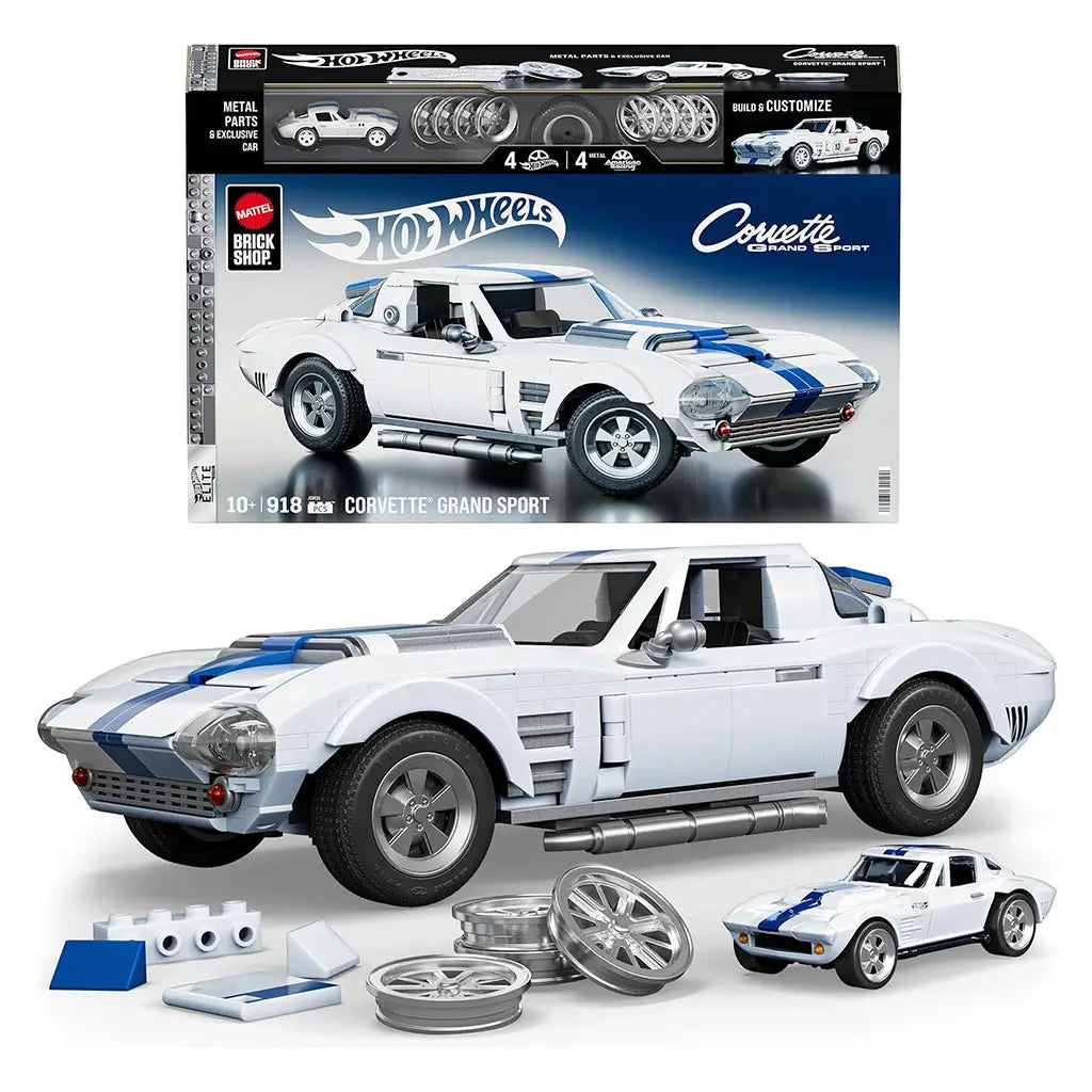 Hot Wheels Corvette Grand Sport building toy kit shown in white plastic bricks with blue racing stripes, detailed coupe body, chrome-style wheels, and side exhaust, displayed on a clean studio background.